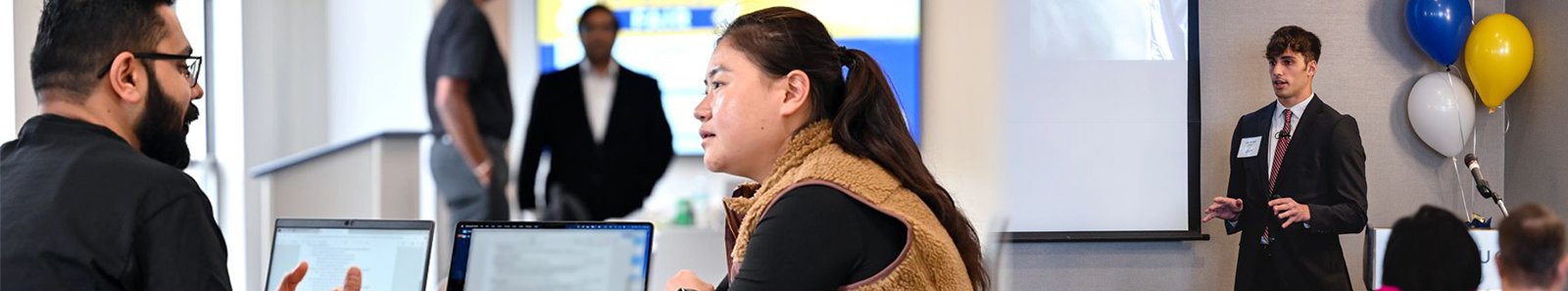 Researchers reviewing data in a Pitt lab